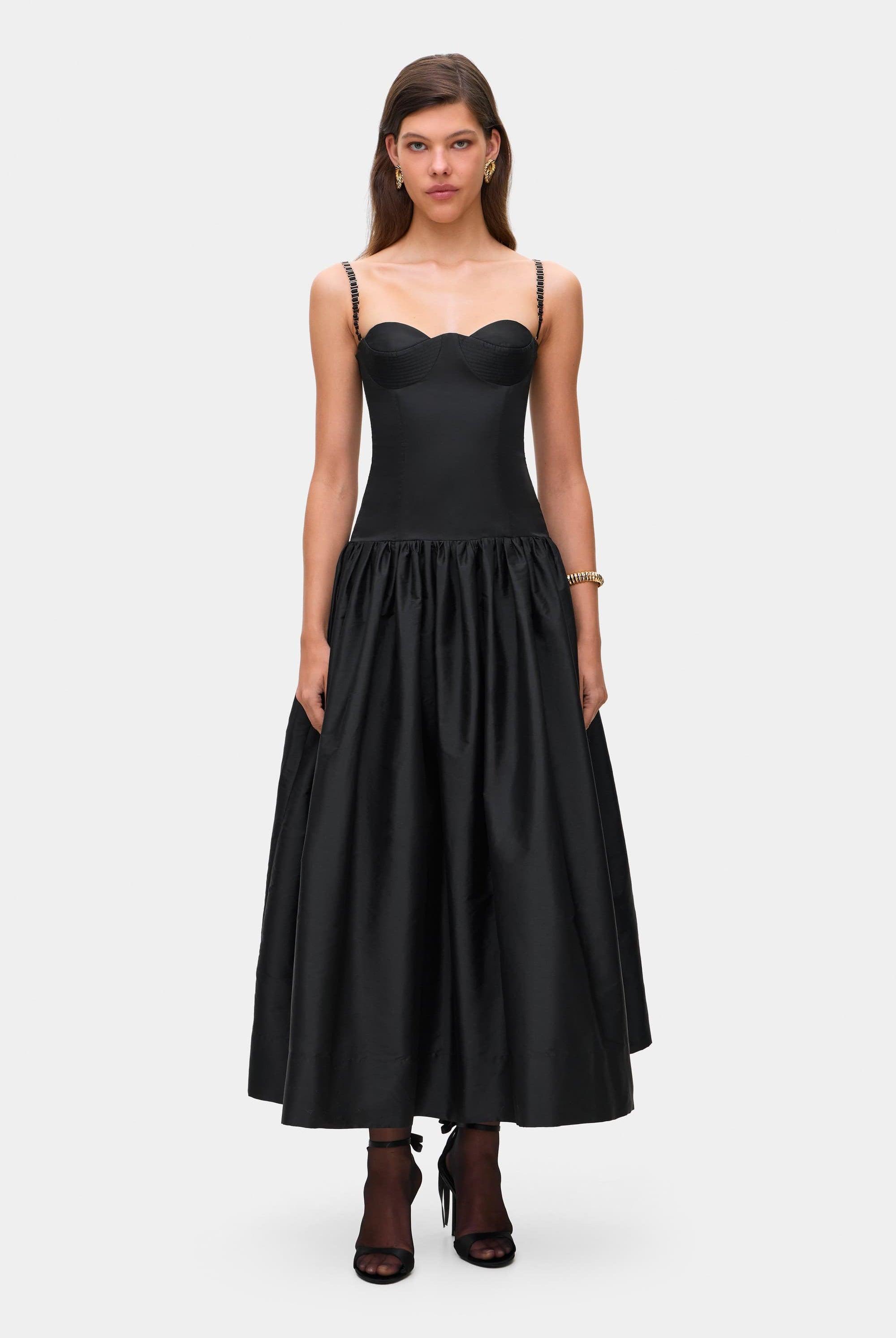 Model in Chloé midi dress with a corset top with stitching and wide skirt front view