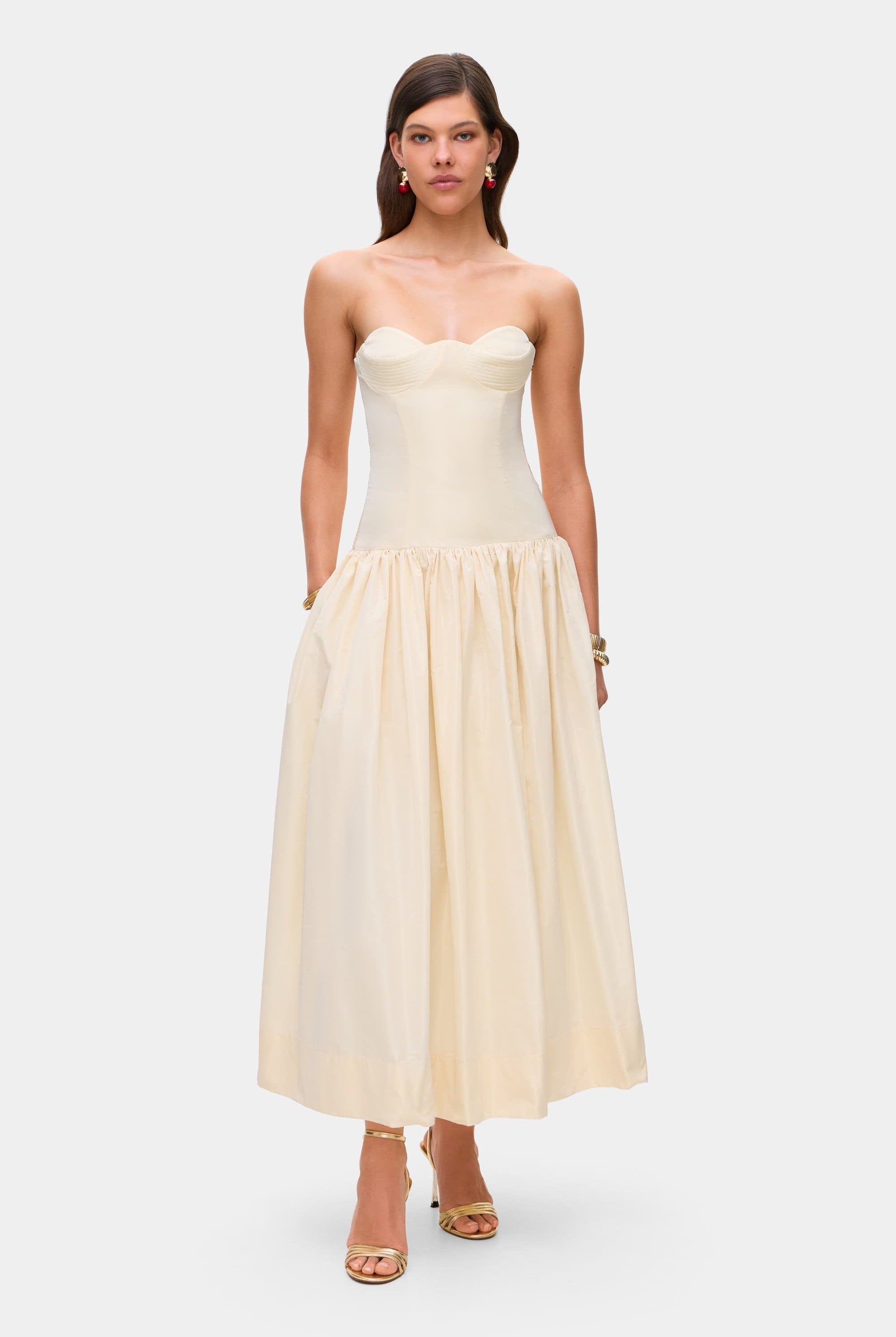 Model in Chloé midi dress with a corset top with stitching and wide skirt front view