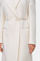Model in fitted maxi boucle Anneliese coat front details view