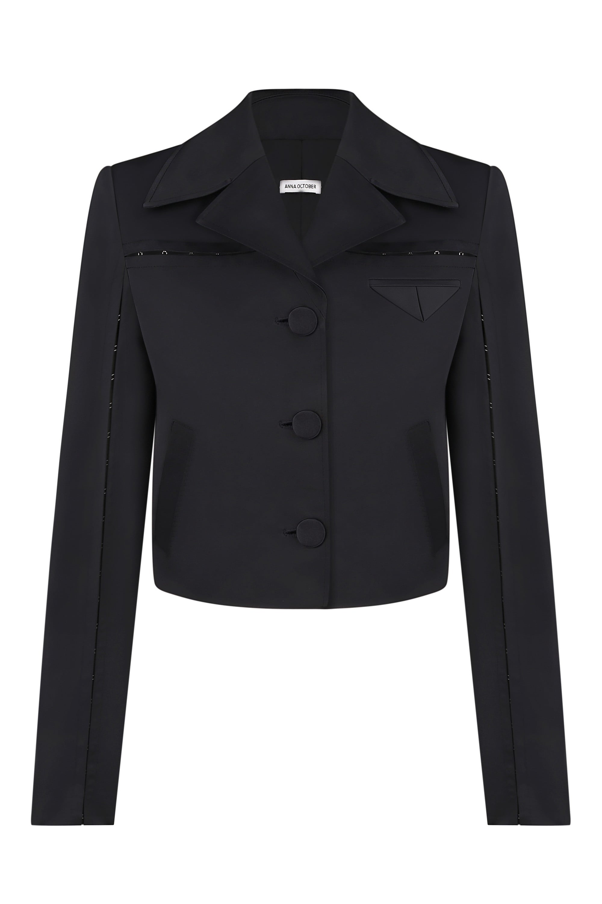 Black Nika jacket with button details on a white background, front view