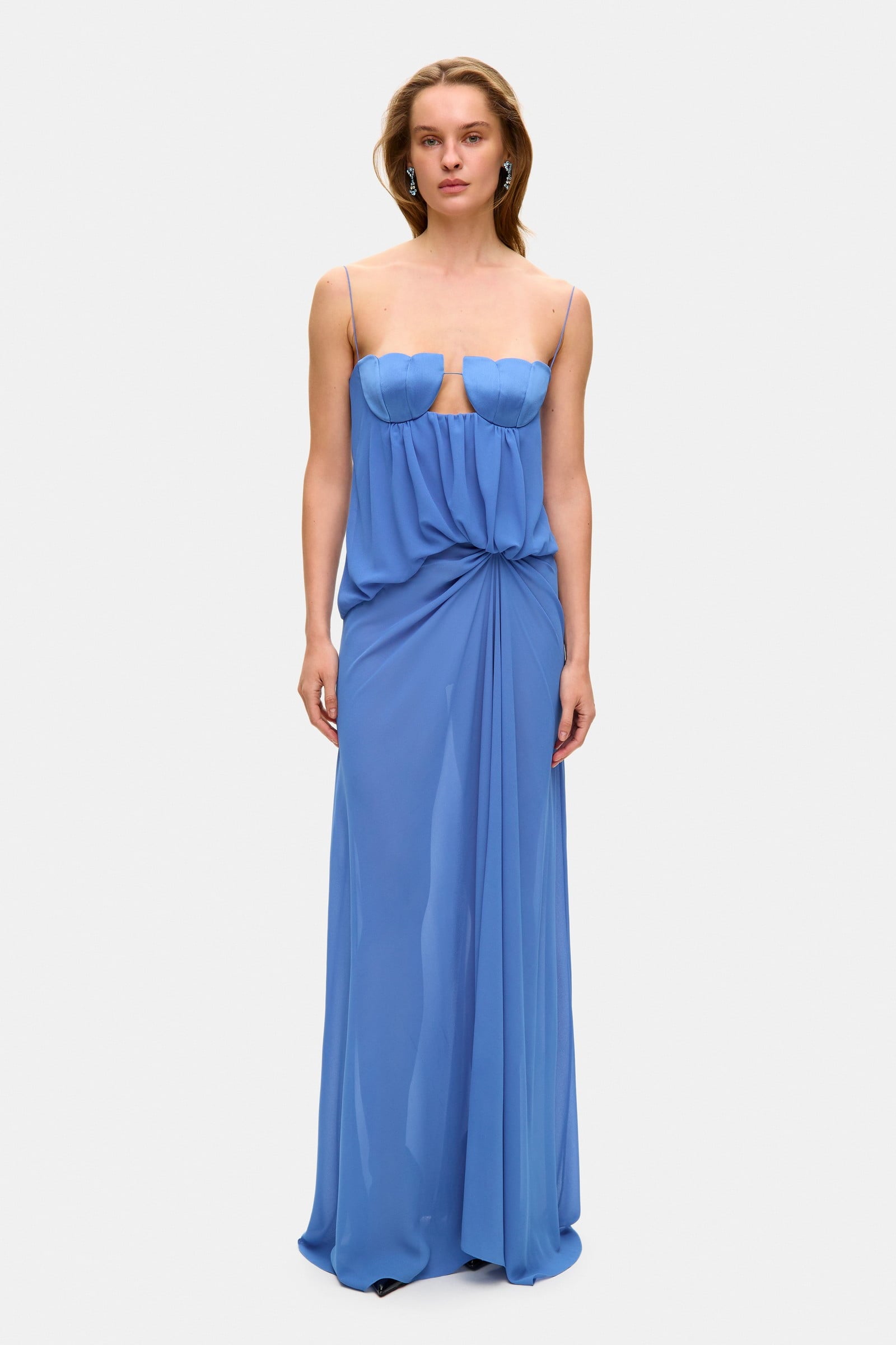 Model in loose maxi Arabella dress with tulip-shaped decorated cups and straps tied into bows front view