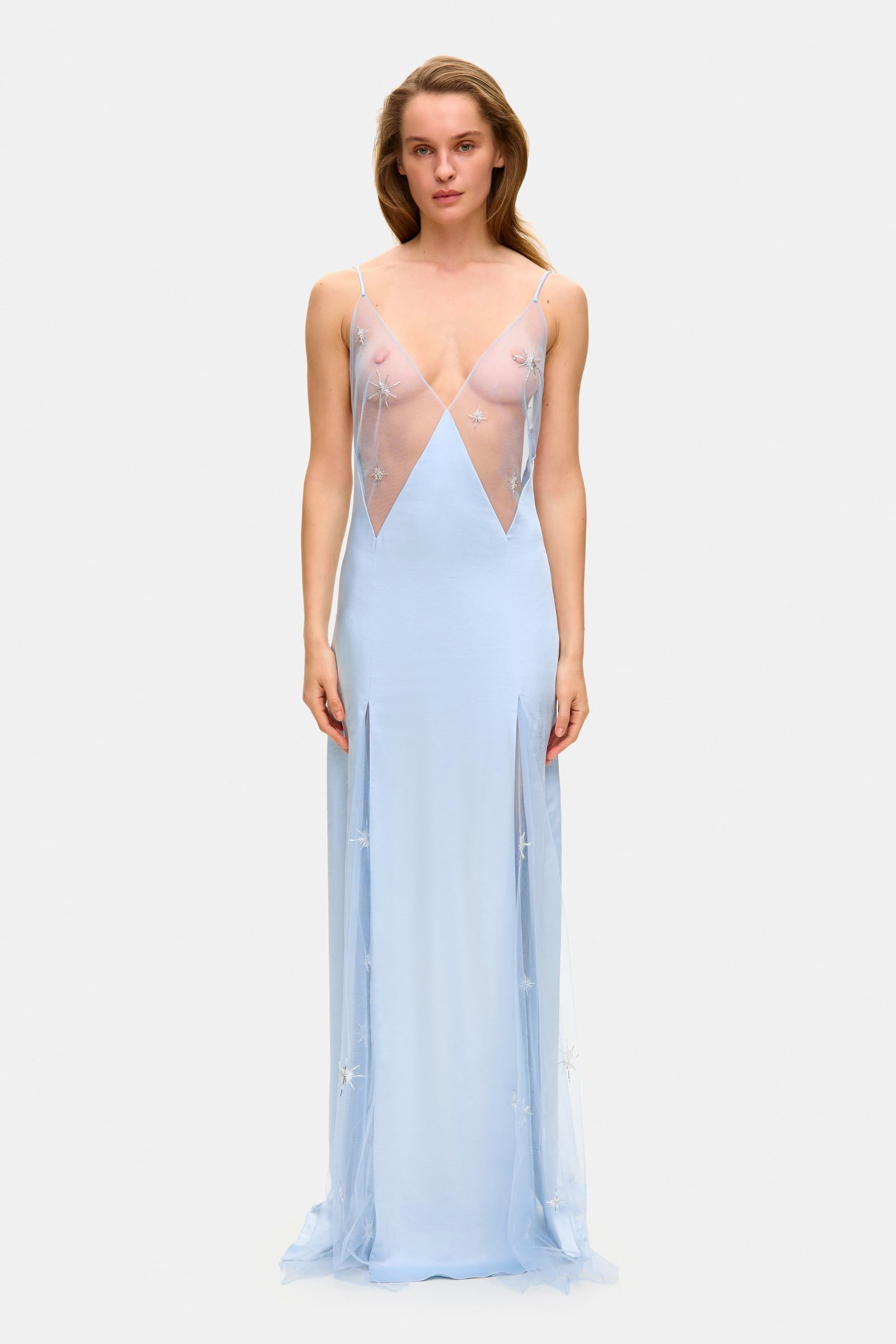 Model in fitted maxi Lolita dress with decorative embroidery all over the dress front view