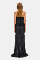 Model in wide-silhouette Clemence top with decored cups back view