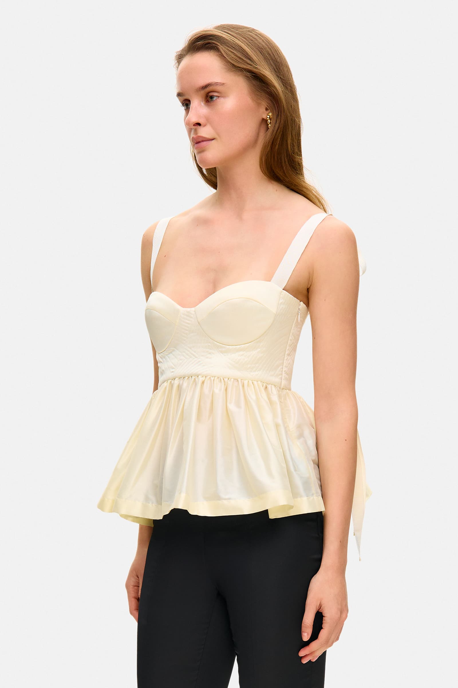 Model in Florine top with cups on straps side view