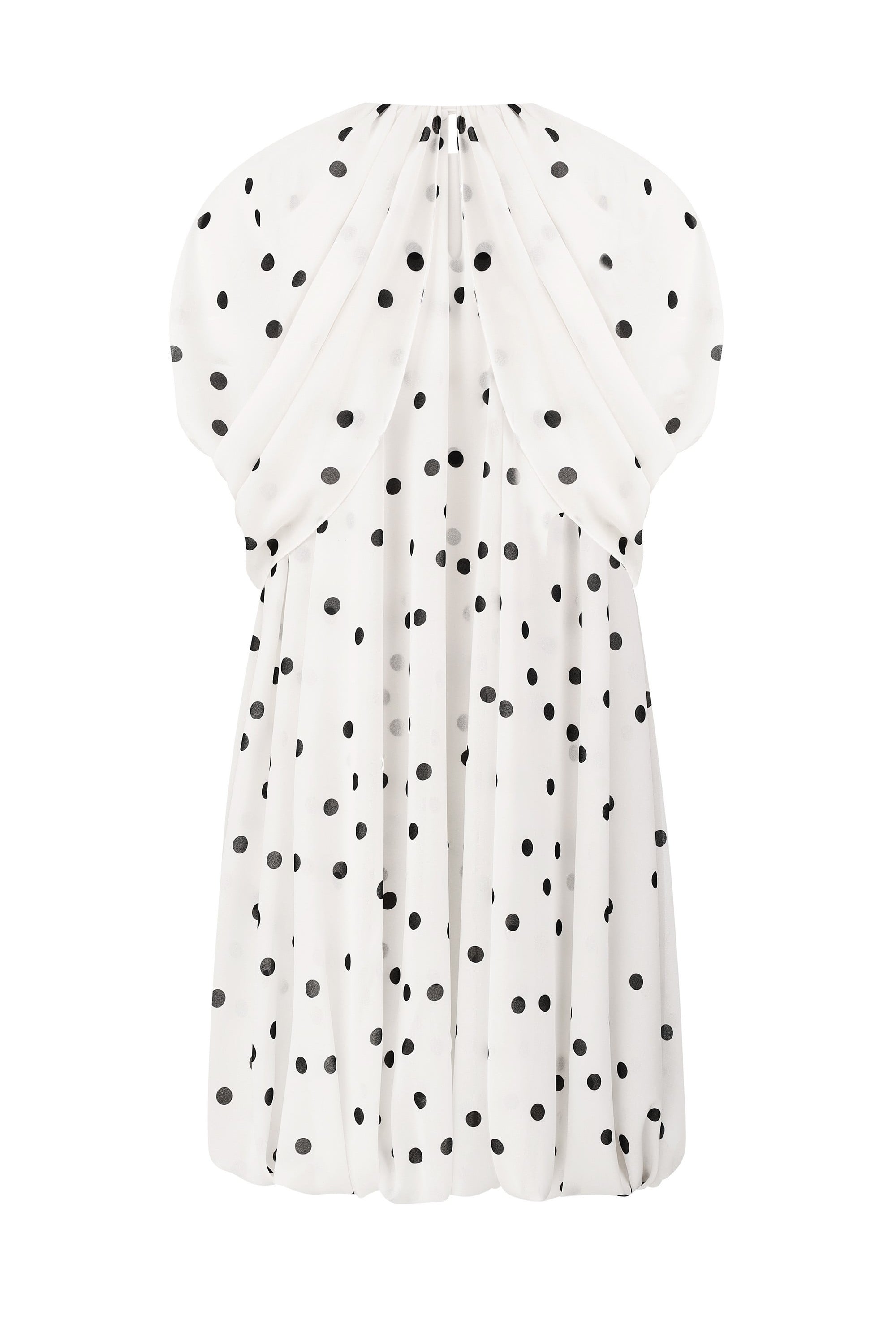 White Mio dress with black polka dots on a light gray background, back view