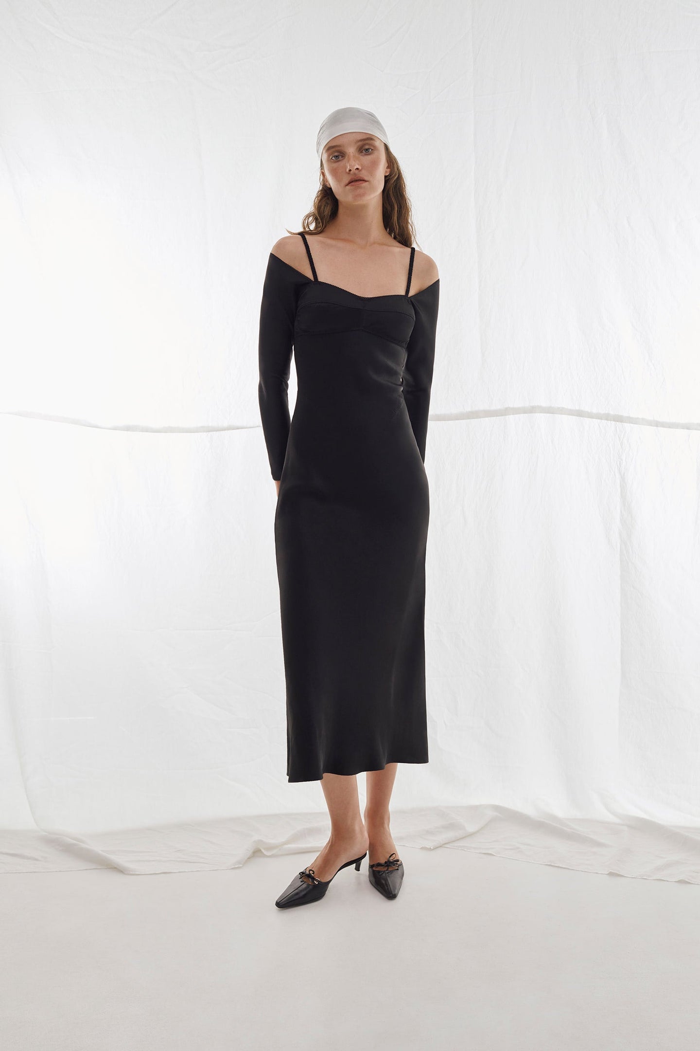 This Melancholy bustier dress is created to manifest woman’s sensuality and elegance. Spun from a soft-touch viscose it has a streamlined silhouette and closely hugs the body before falling to a gently flared hem.
