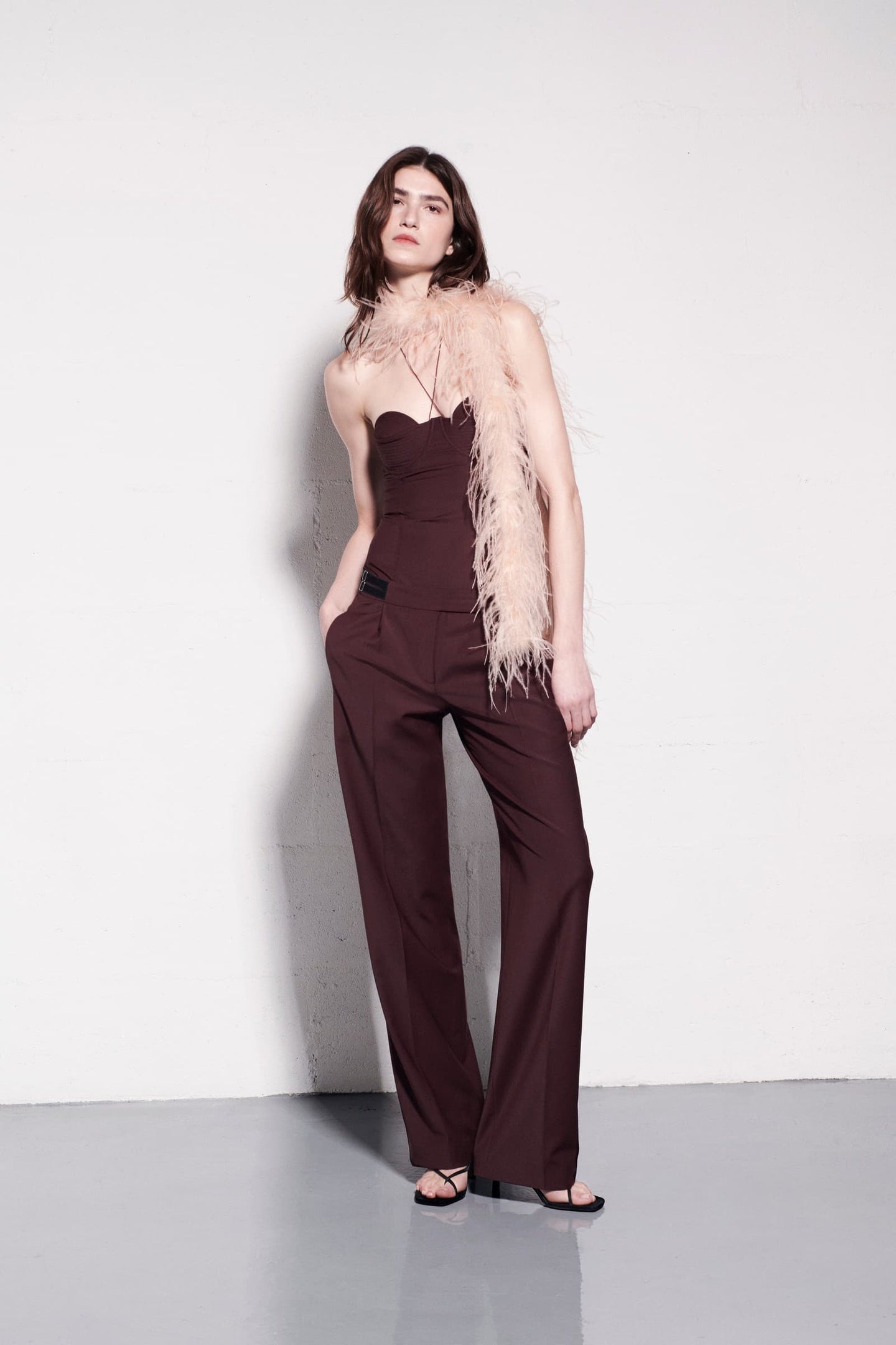 Model in burgundy Nora pants