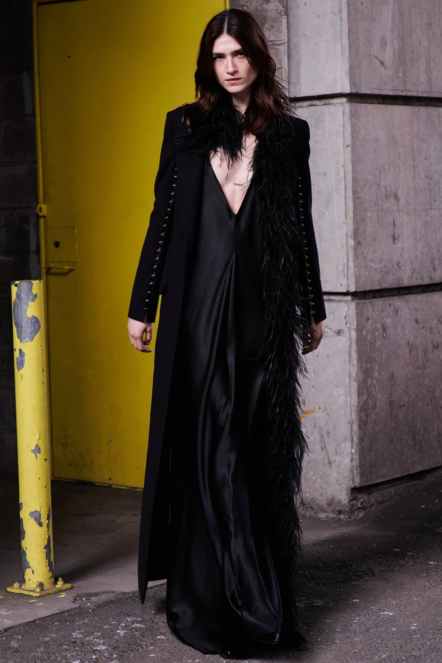 Model in black Nicole coat