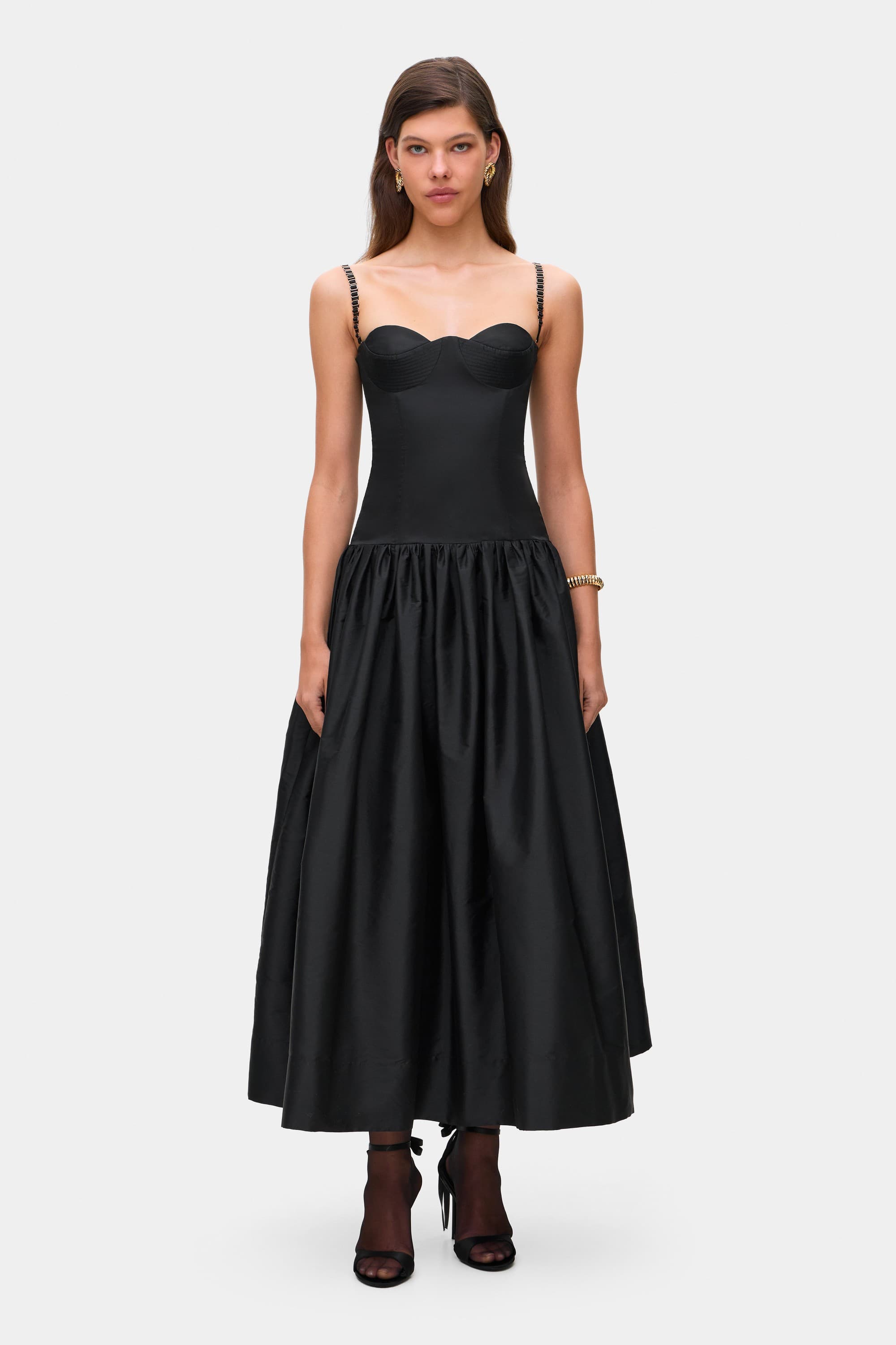 Model in Chloé midi dress with a corset top with stitching and wide skirt front view