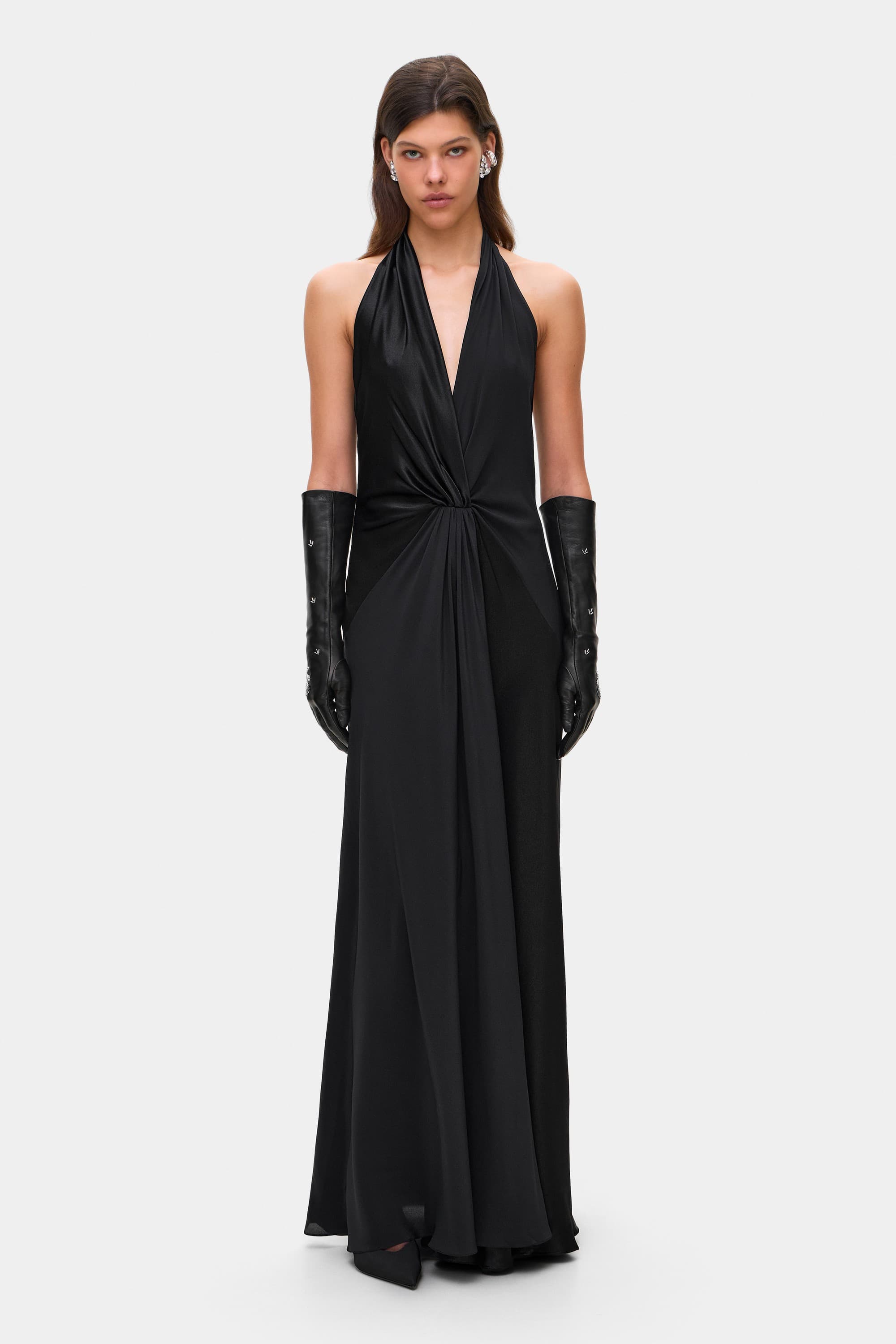 Model in open back Ruth maxi dress with decorative draping on the front, front view
