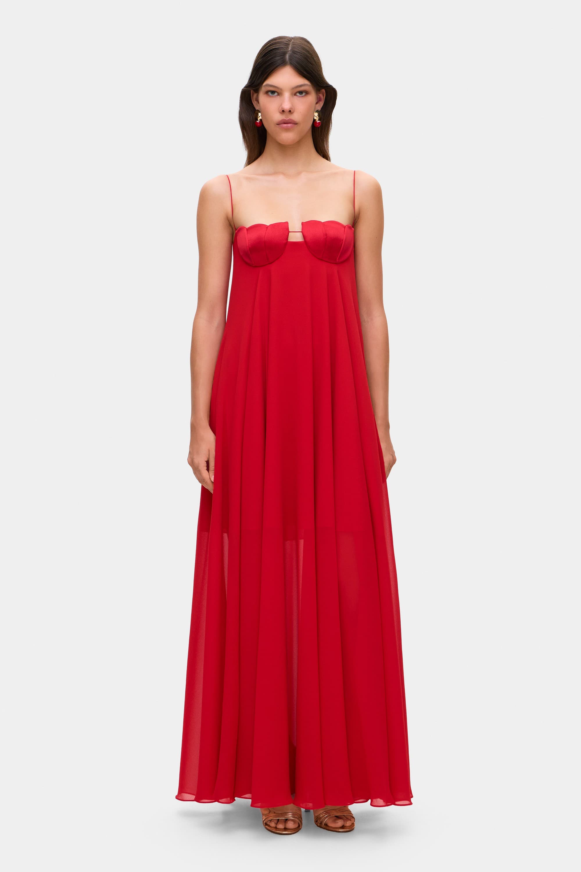 Model in Solomia maxi dress with tulip-shaped decorated cups and chiffon maxi sun skirt front view