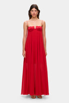 Model in Solomia maxi dress with tulip-shaped decorated cups and chiffon maxi sun skirt front view