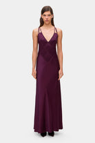 Model in Melania maxi dress with decorative lines on the bodice front view