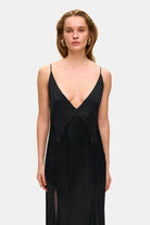 Model in fitted maxi Adelina dress front details view