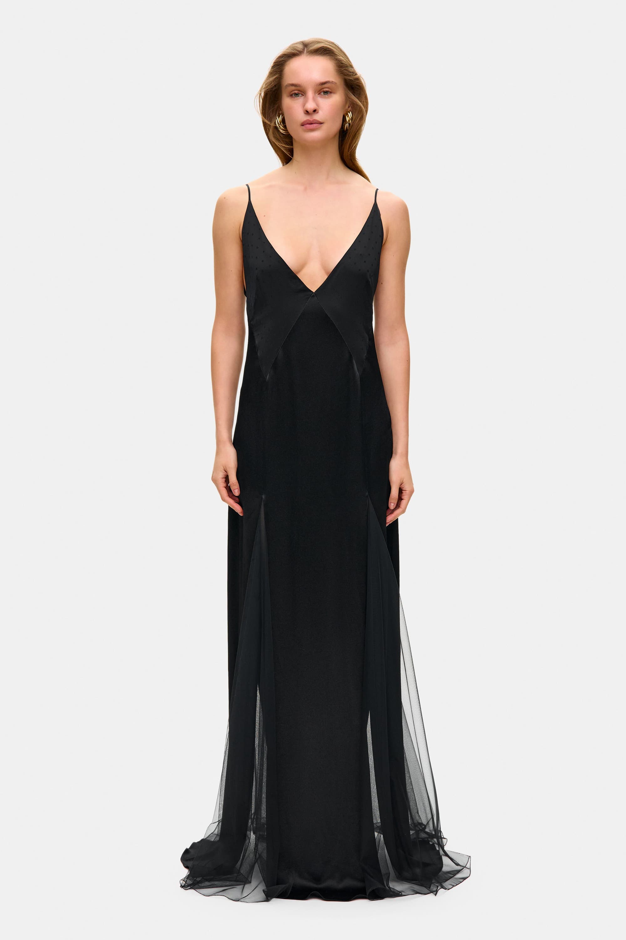 Model in fitted Adelina maxi dress front view