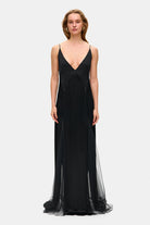 Model in fitted maxi Adelina dress front view