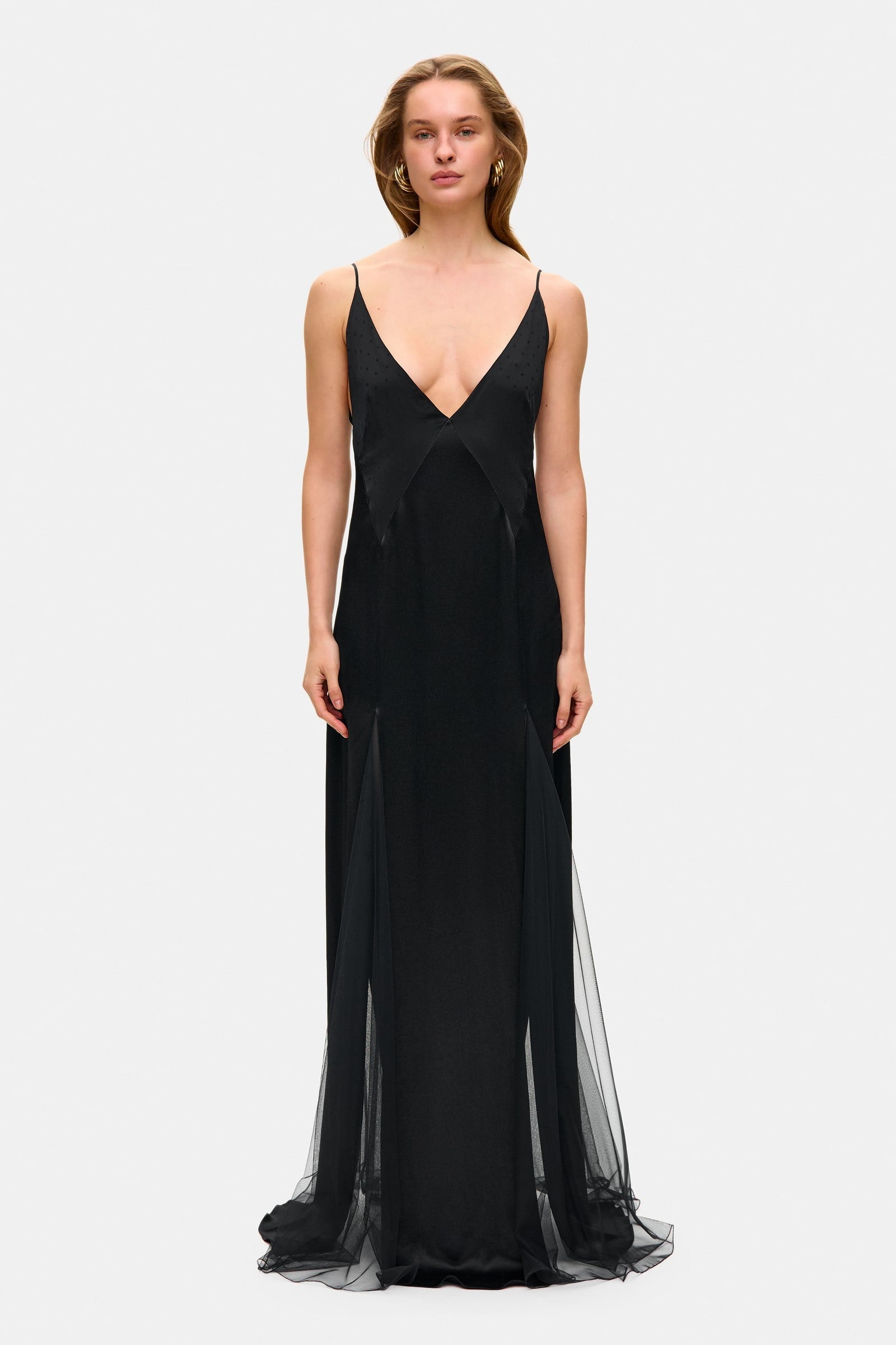 Model in fitted maxi Adelina dress front view