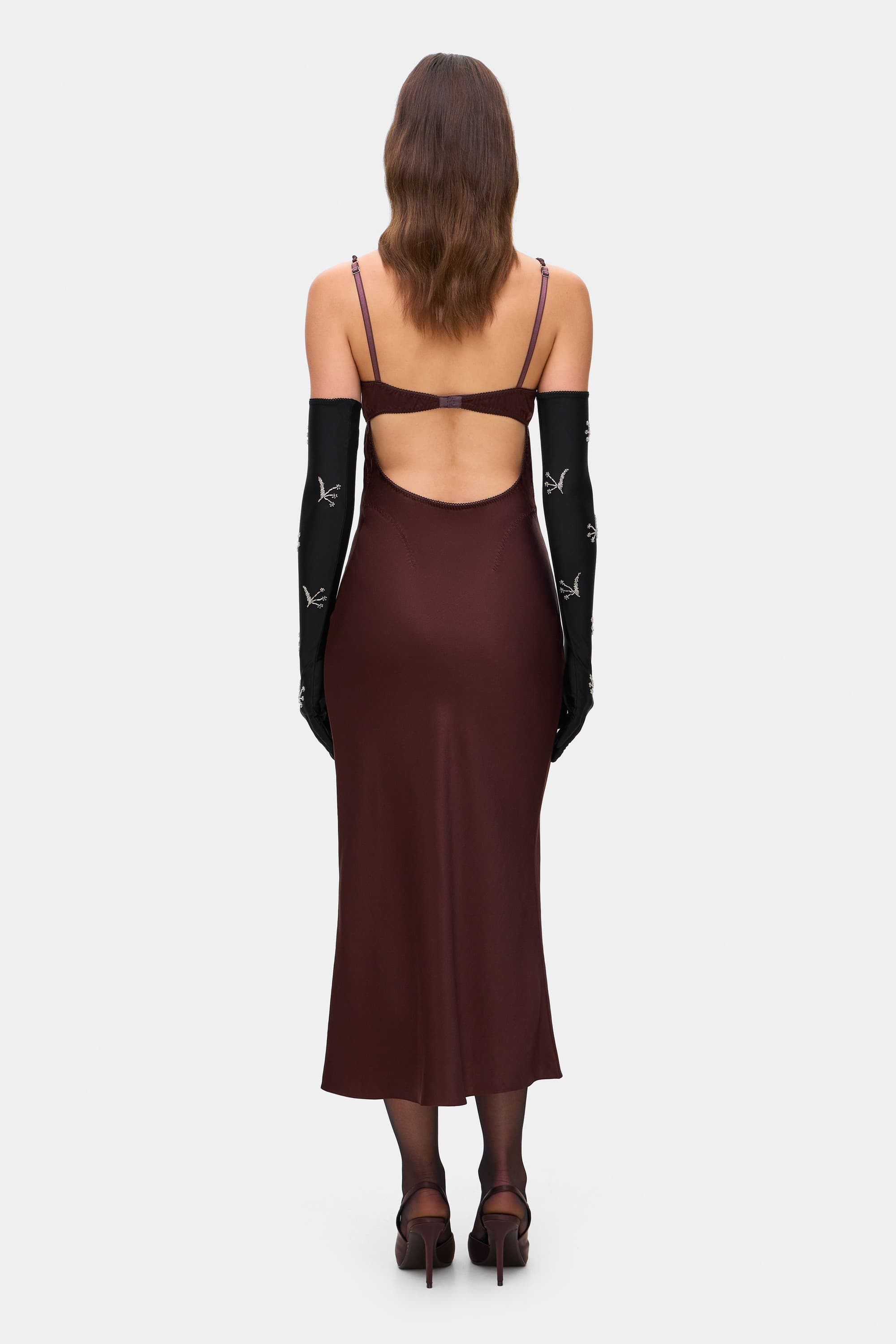 Model in open back Waterlily midi dress with a lingerie-style bodice back view