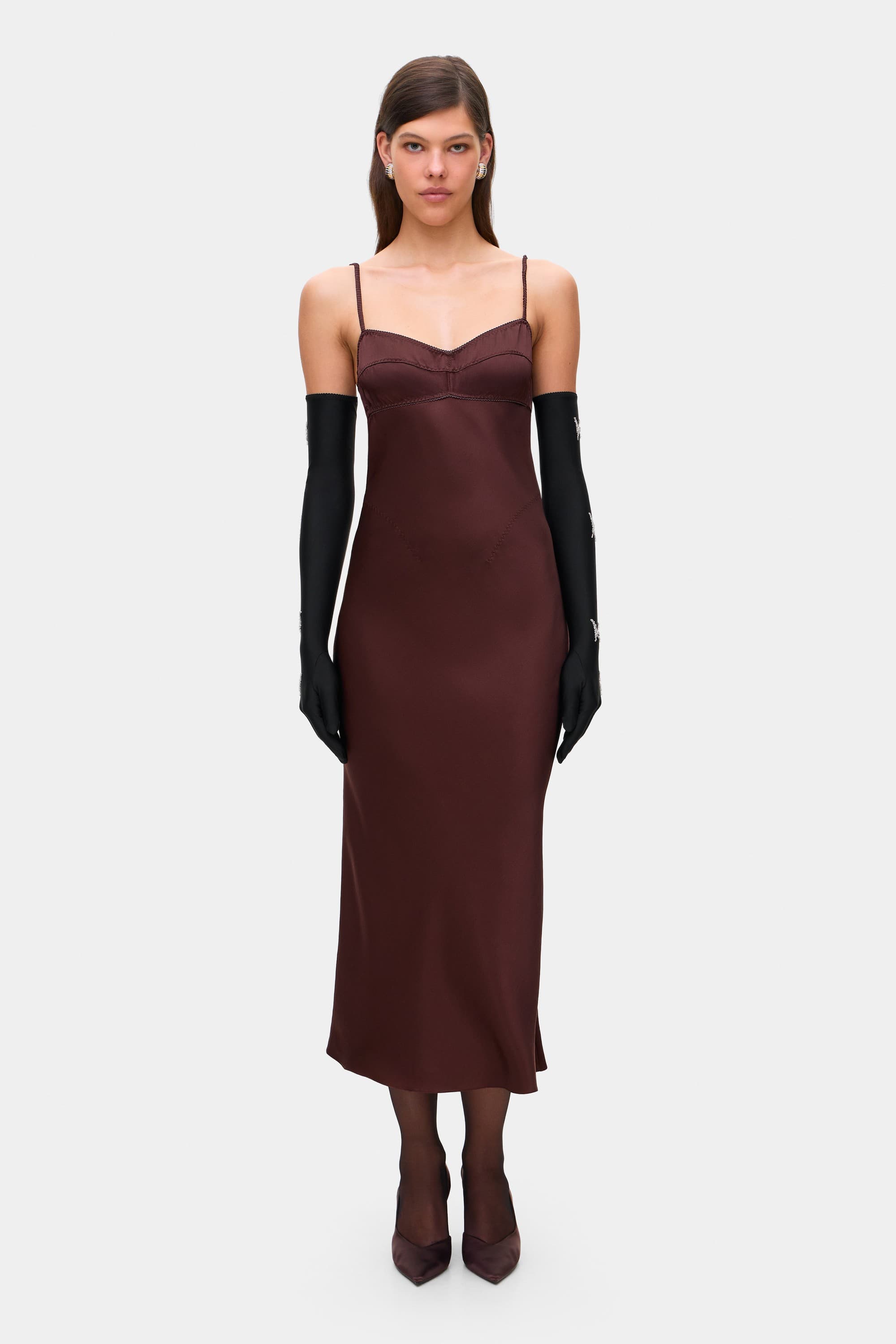 Model in open back Waterlily midi dress with a lingerie-style bodice front view