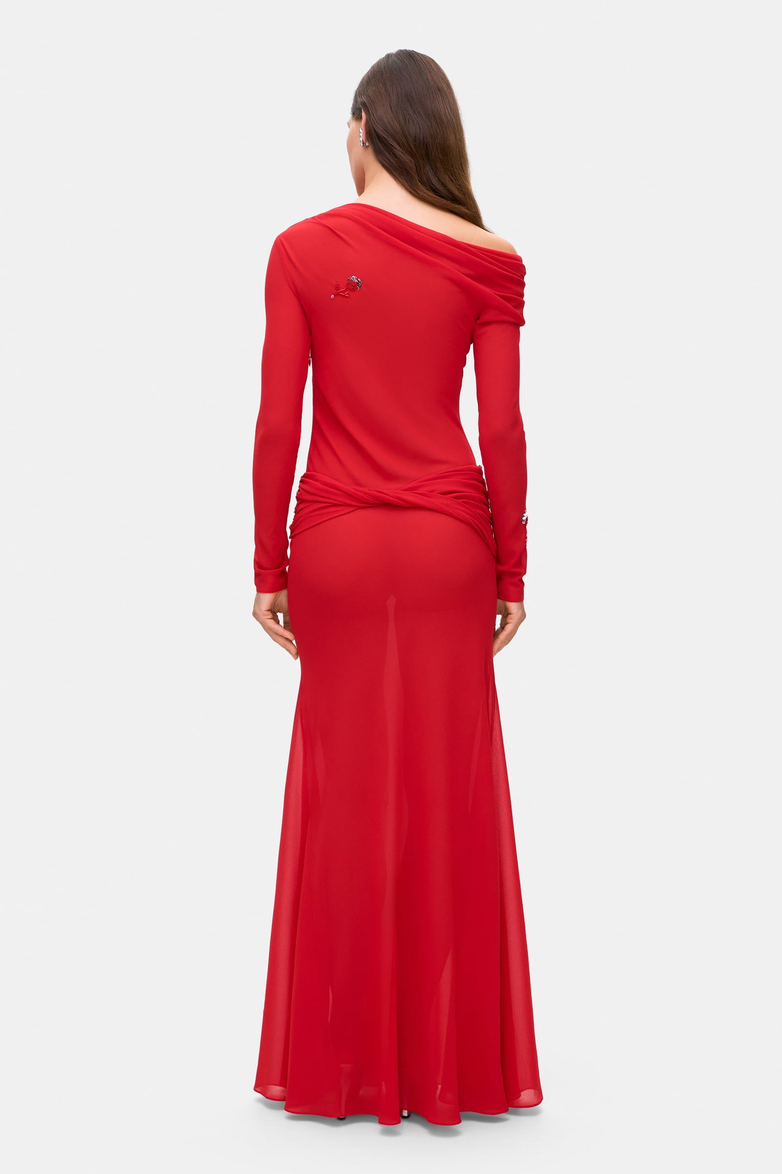 Model in Julie maxi dress with with decorative drapering and embroidery back view