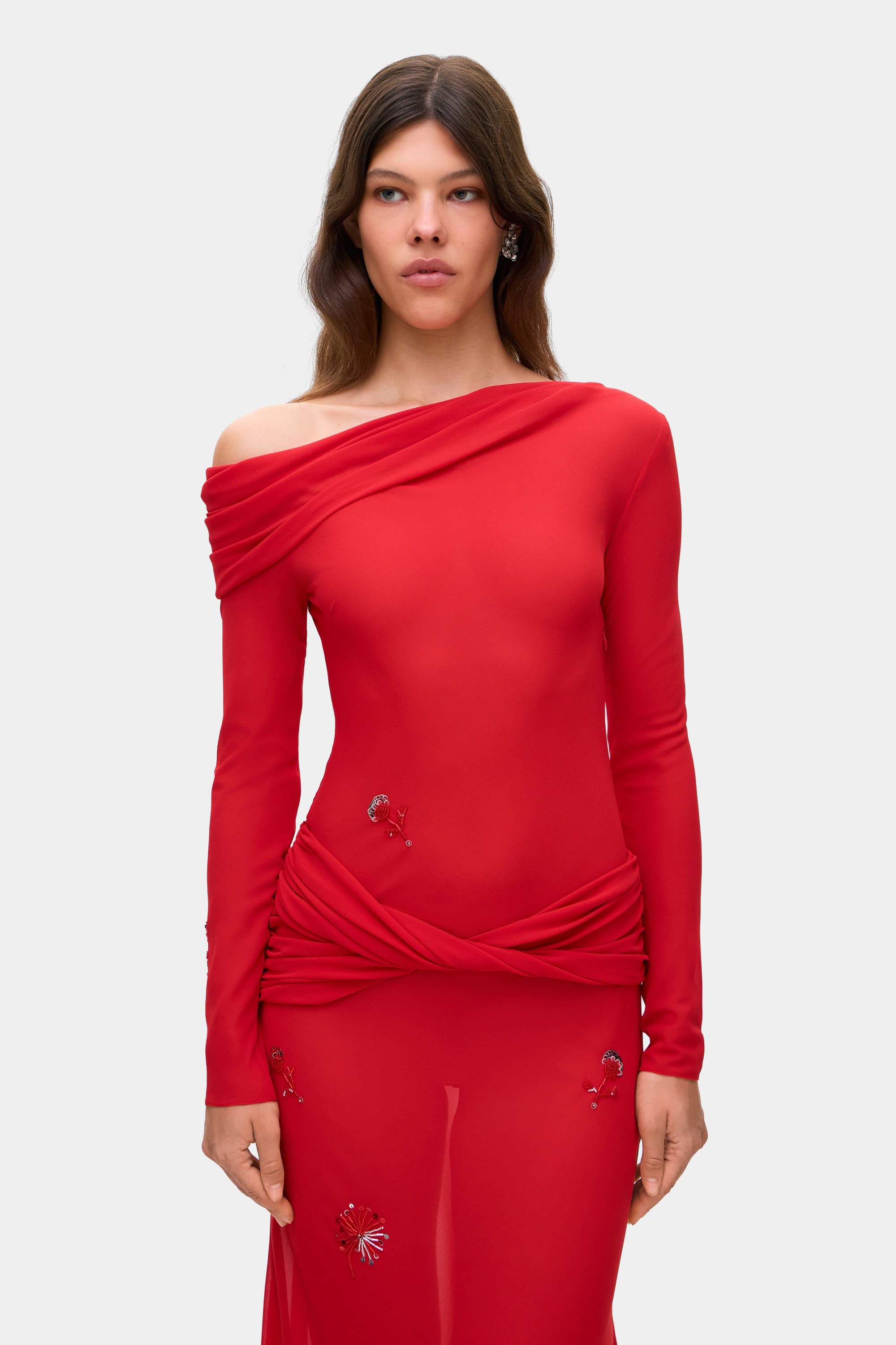 Model in Julie maxi dress with with decorative drapering and embroidery front details view