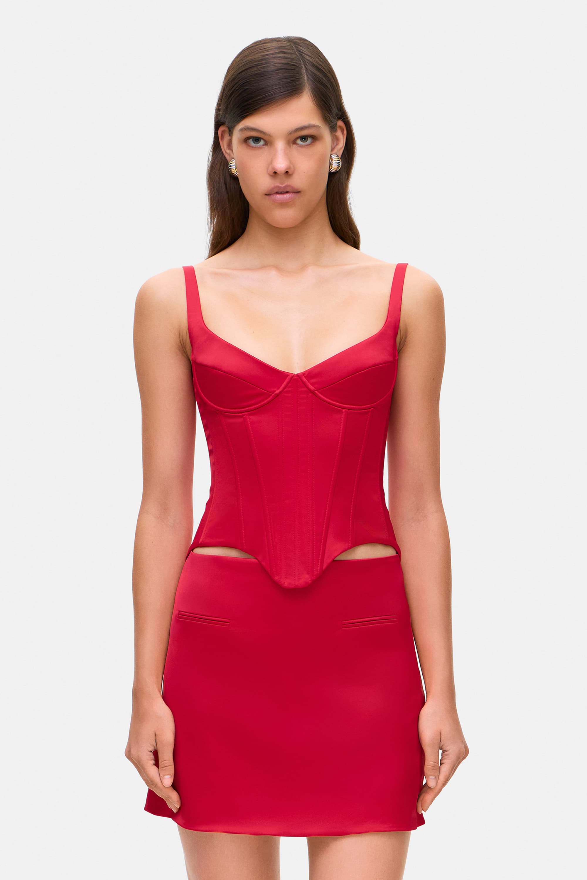 Model in corset-style Zhadana top with decored cups front view