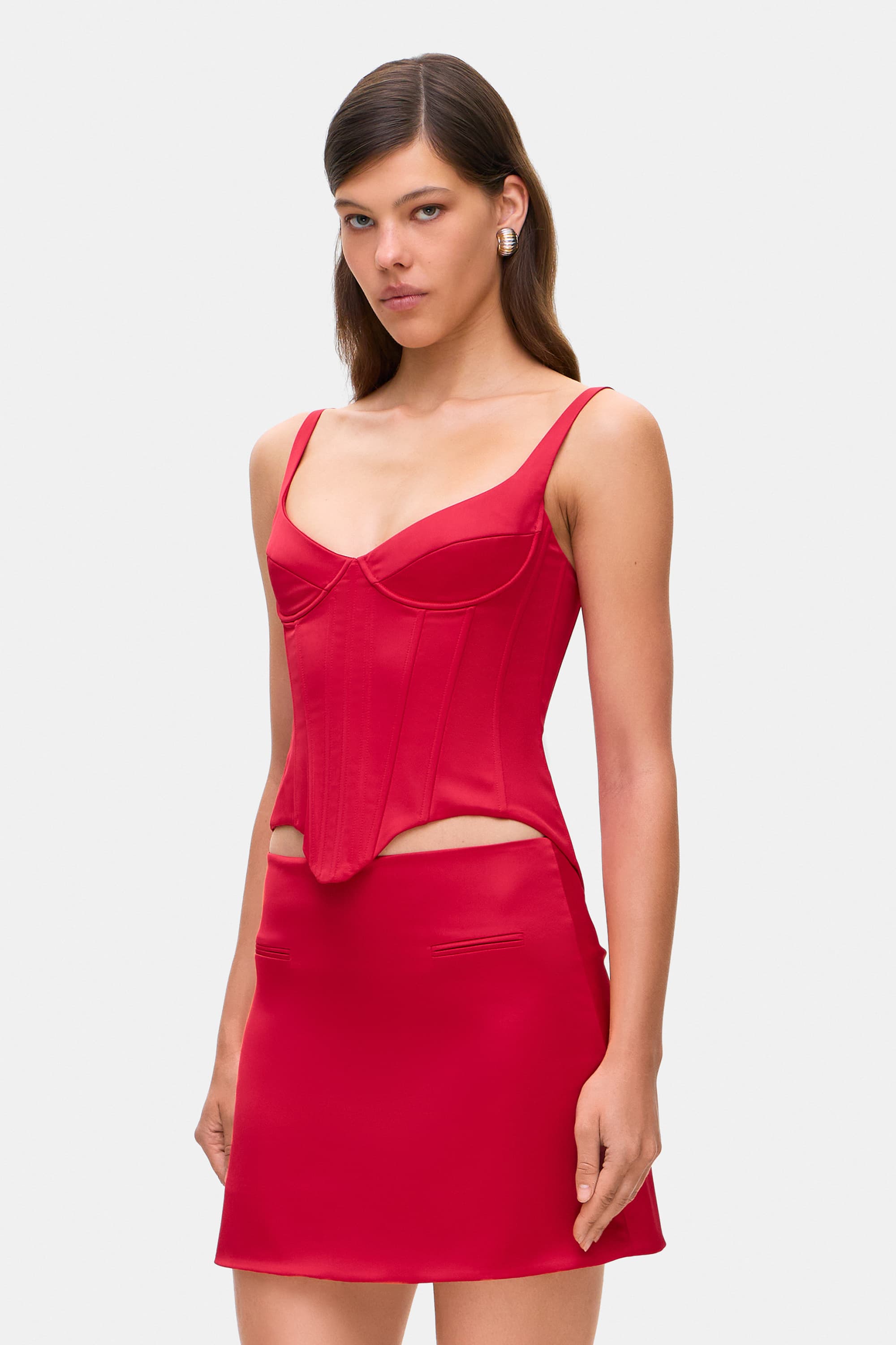 Model in corset-style Zhadana top with decored cups side view