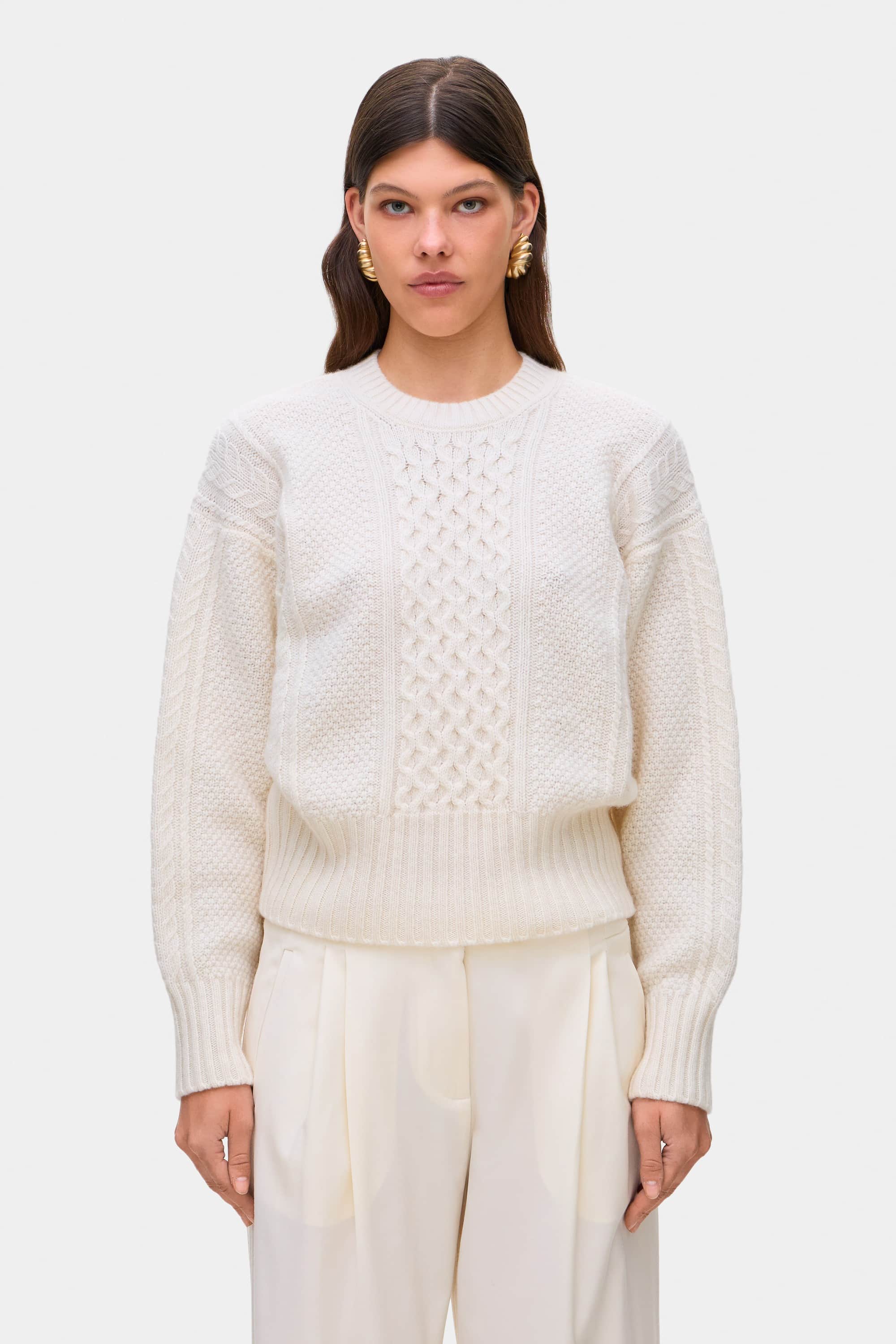 Model in cable knit Verona jumper front view
