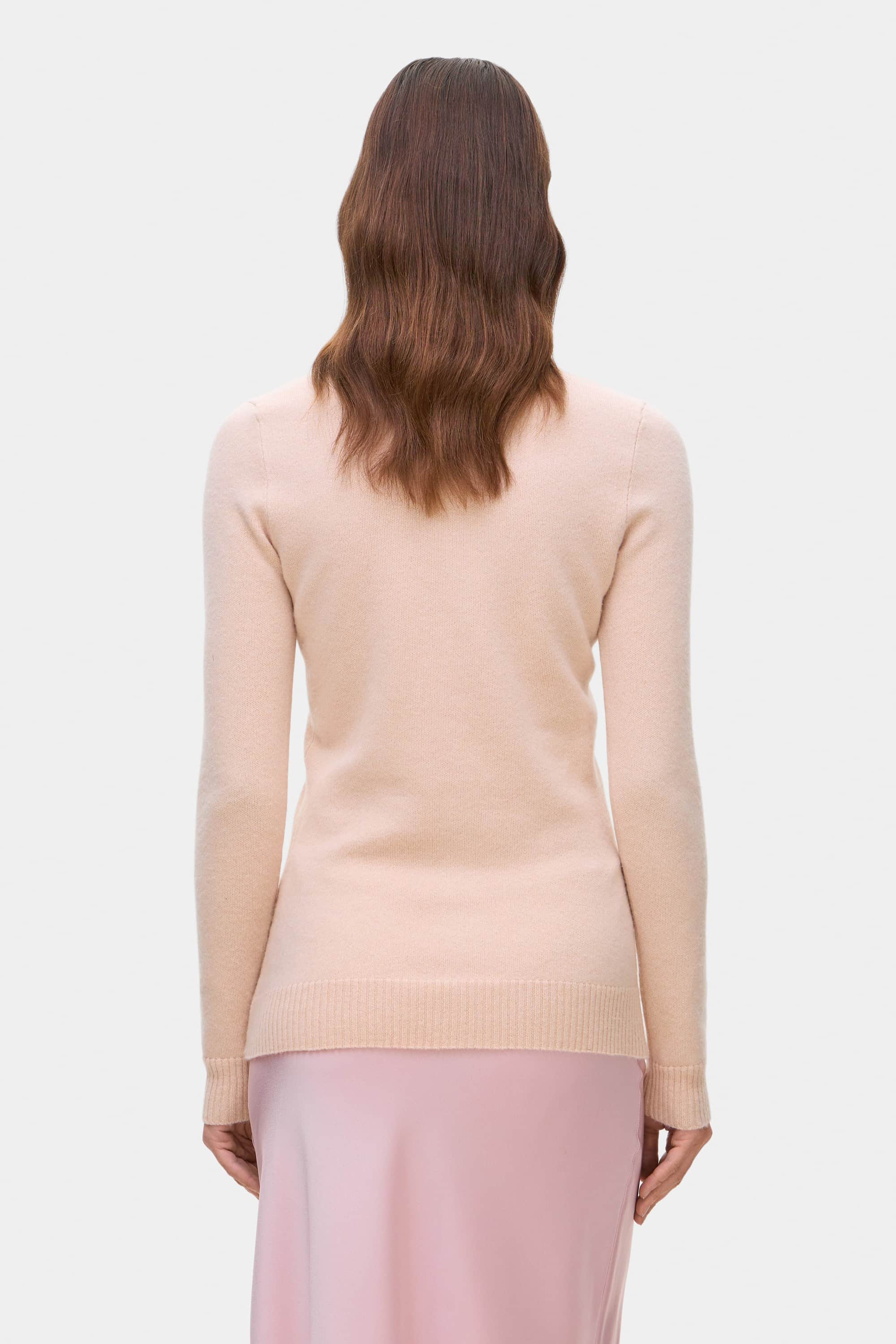 Model in cashmere Daniella top back view