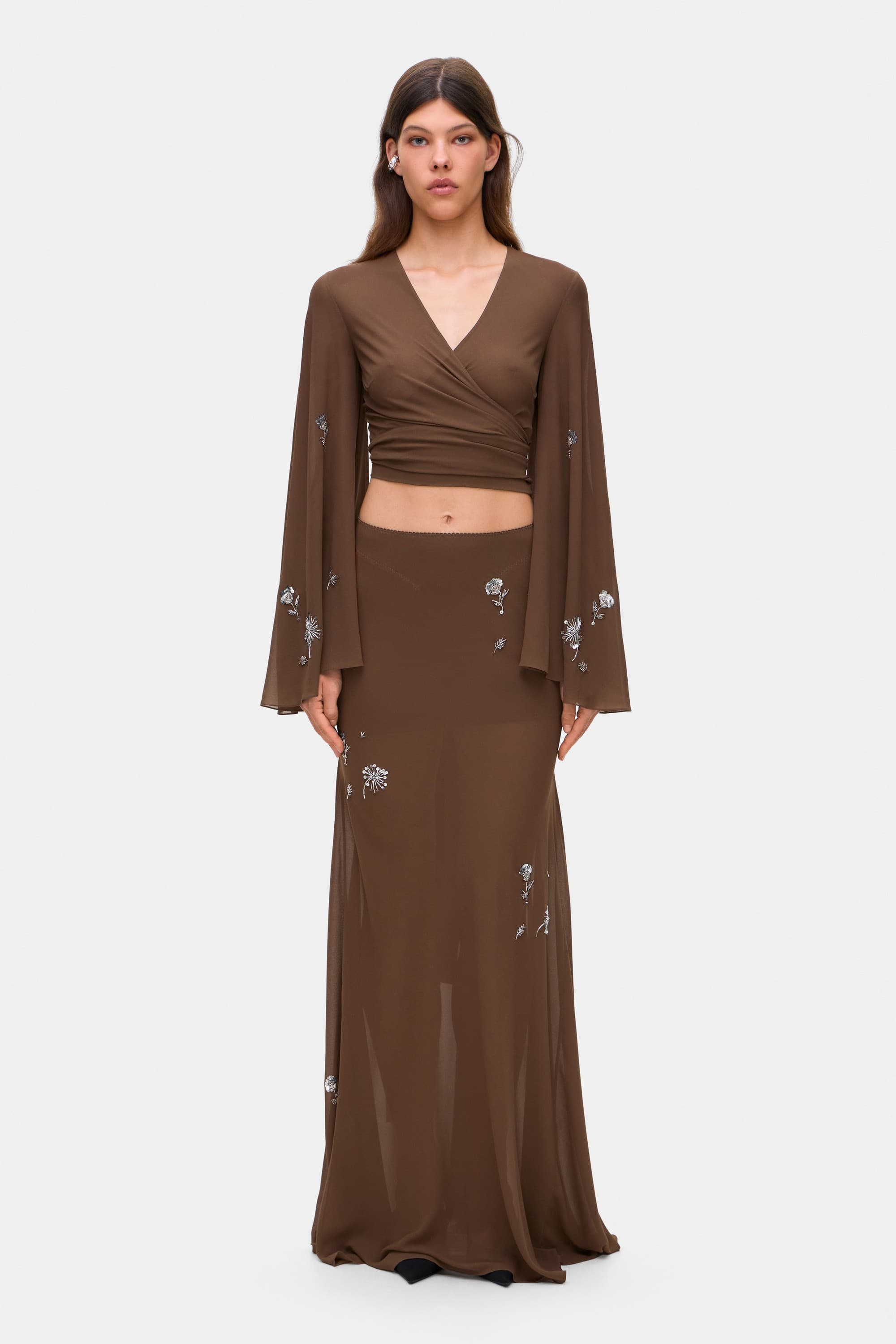 Model in chiffon Embroidered Dorothy maxi skirt with a scarf front view