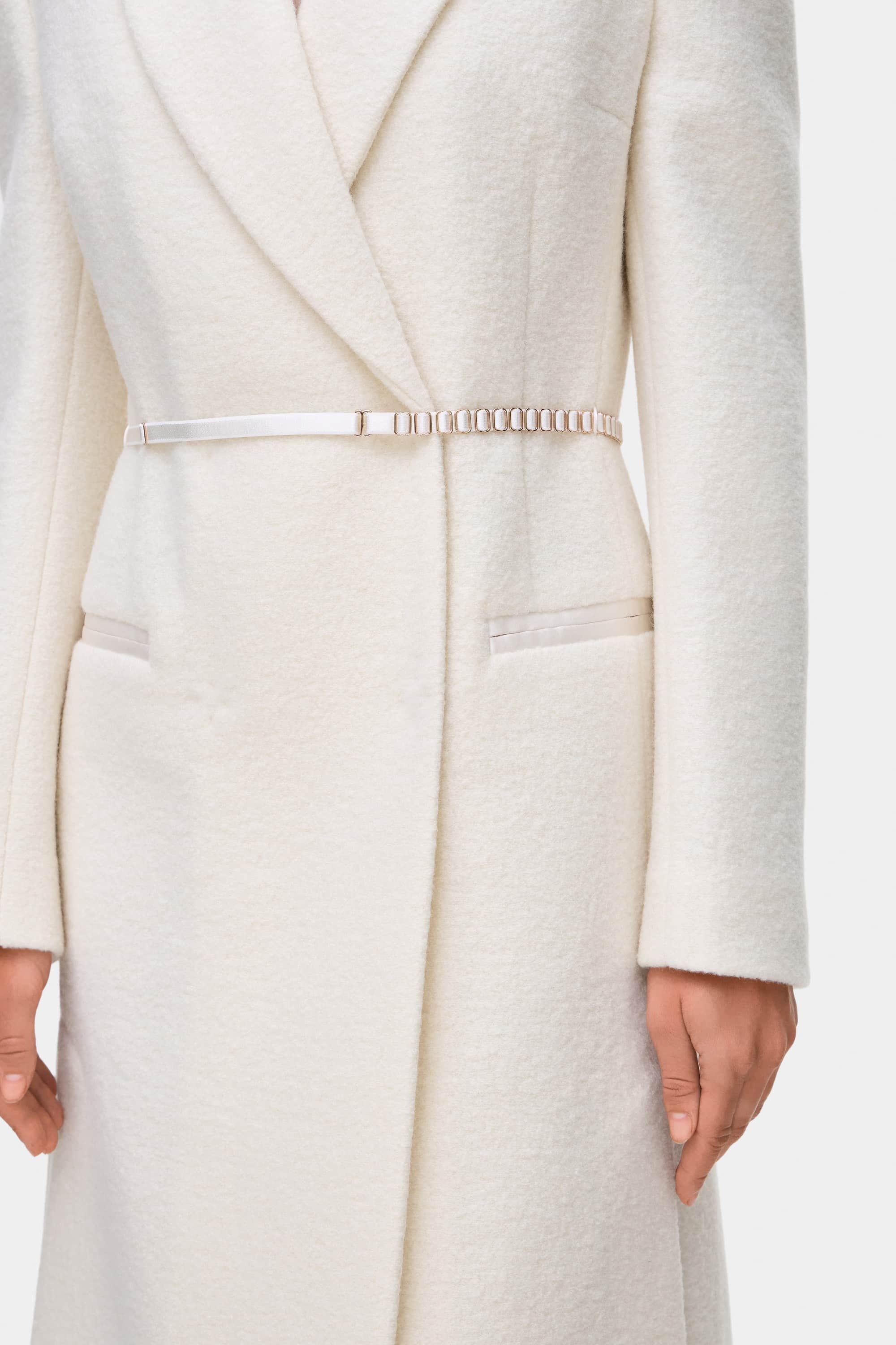 Model in fitted maxi boucle Anneliese coat front details view