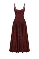 A sleeveless midi Antoinette dress in a deep burgundy velvet fabric, featuring a structured bodice, thin shoulder straps, and a flared skirt, shown against a plain white background, front view
