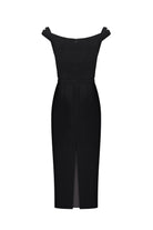 A black off-the-shoulder Judith dress with a fitted bodice, defined waist, and front slit, shown on a plain white background, back view