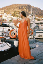 Model in orange Charlize dress, Hydra