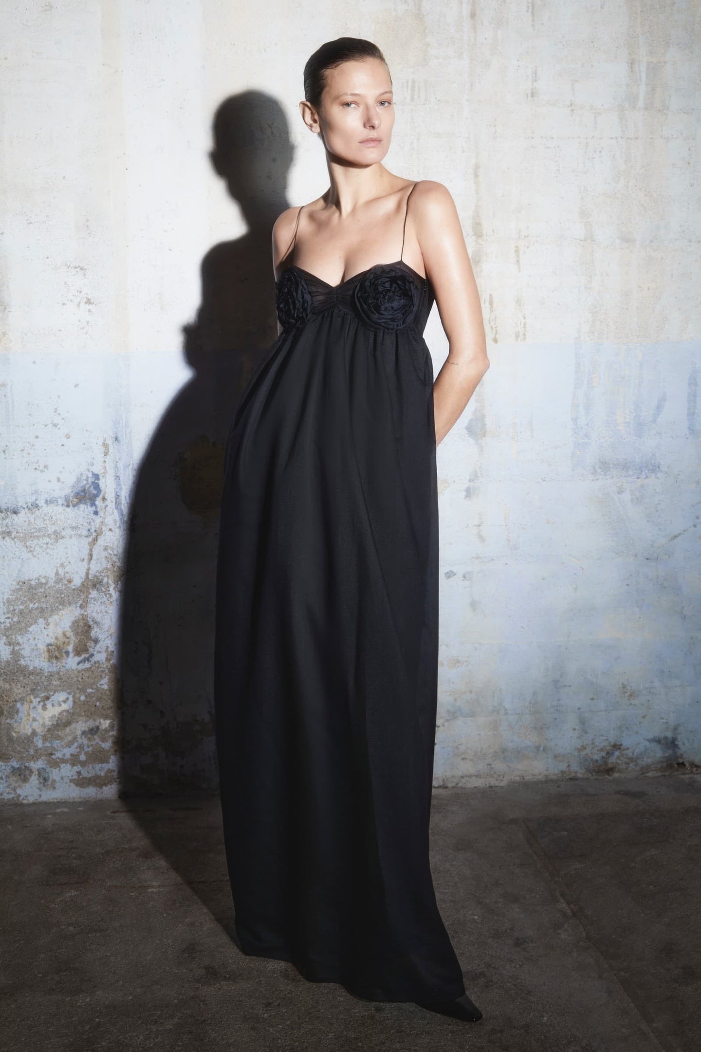 Model in black Corinne dress