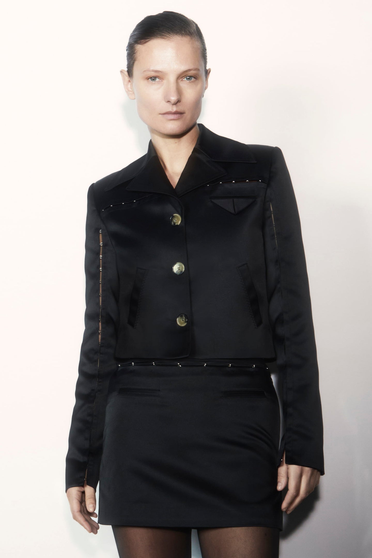 Model in black Nika jacket