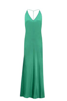Open back maxi Justina dress with flowing design and a slit front view