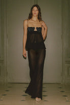 Model in silk chiffon Lola maxi skirt