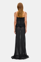 Model in silk chiffon Lola maxi skirt back view