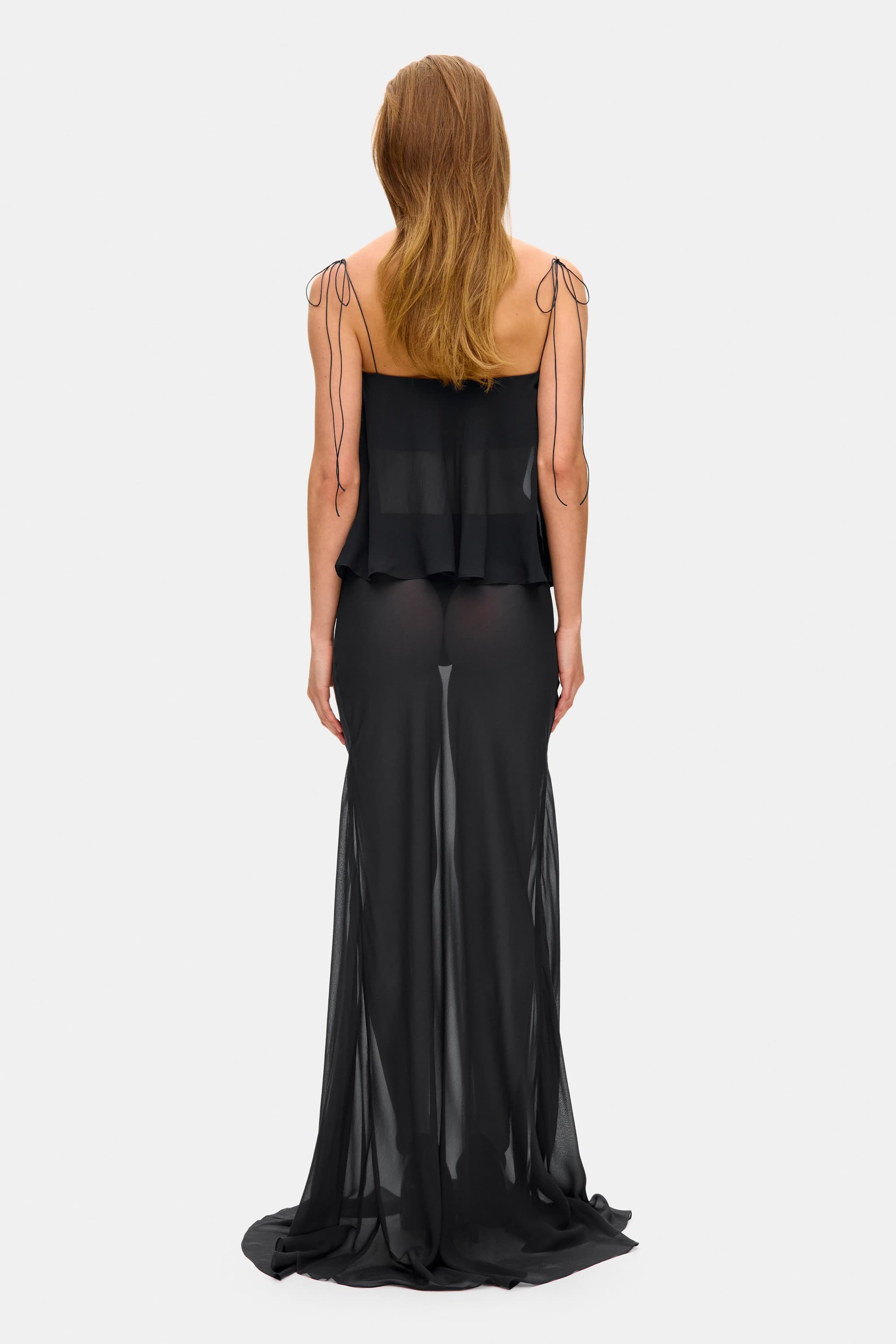 Model in silk chiffon Lola maxi skirt back view