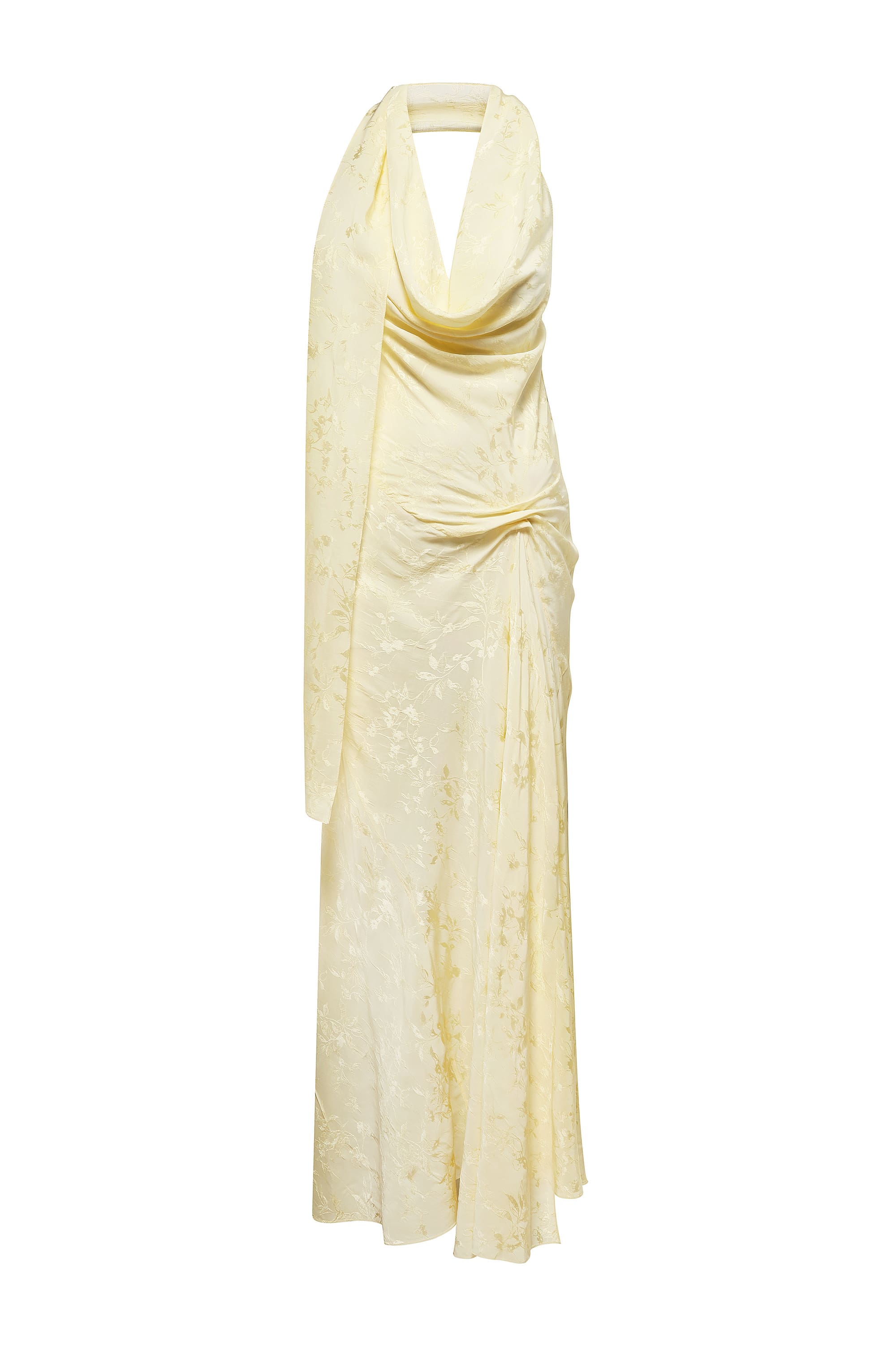 A pale yellow halter-neck maxi Kelly dress with a draped cowl neckline, gathered waist, and subtle tonal floral pattern, shown on a plain white background, front view