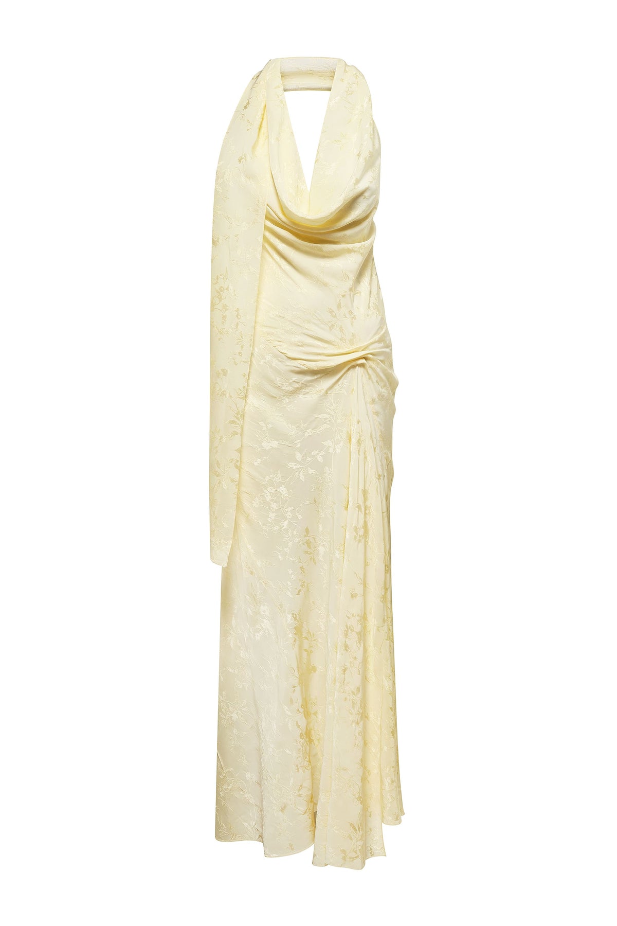A pale yellow halter-neck maxi Kelly dress with a draped cowl neckline, gathered waist, and subtle tonal floral pattern, shown on a plain white background, front view