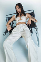 Model in Cecile top with decored stiches on the bodice