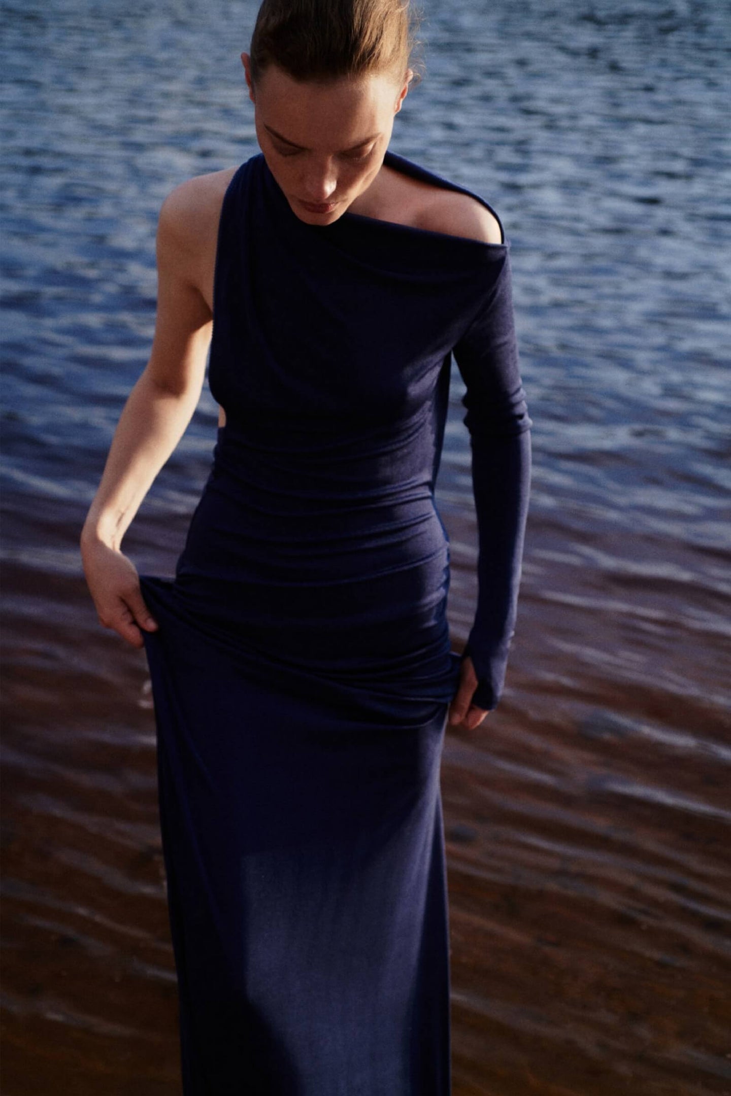 Model in dark blue Shaya dress