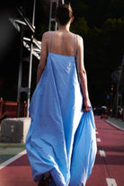 Model in baby blue Luis dress back view