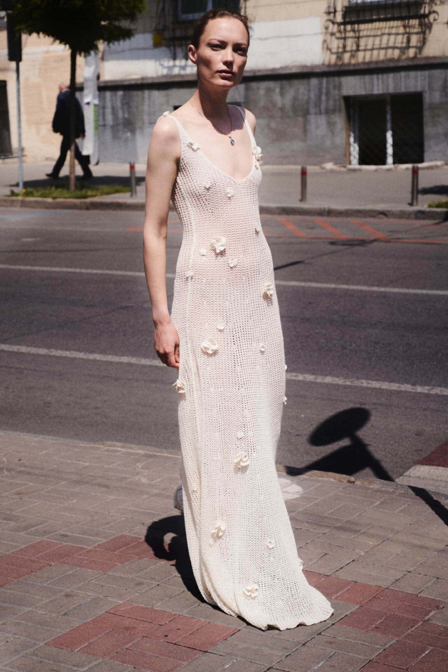 Model in ivory Astrid dress