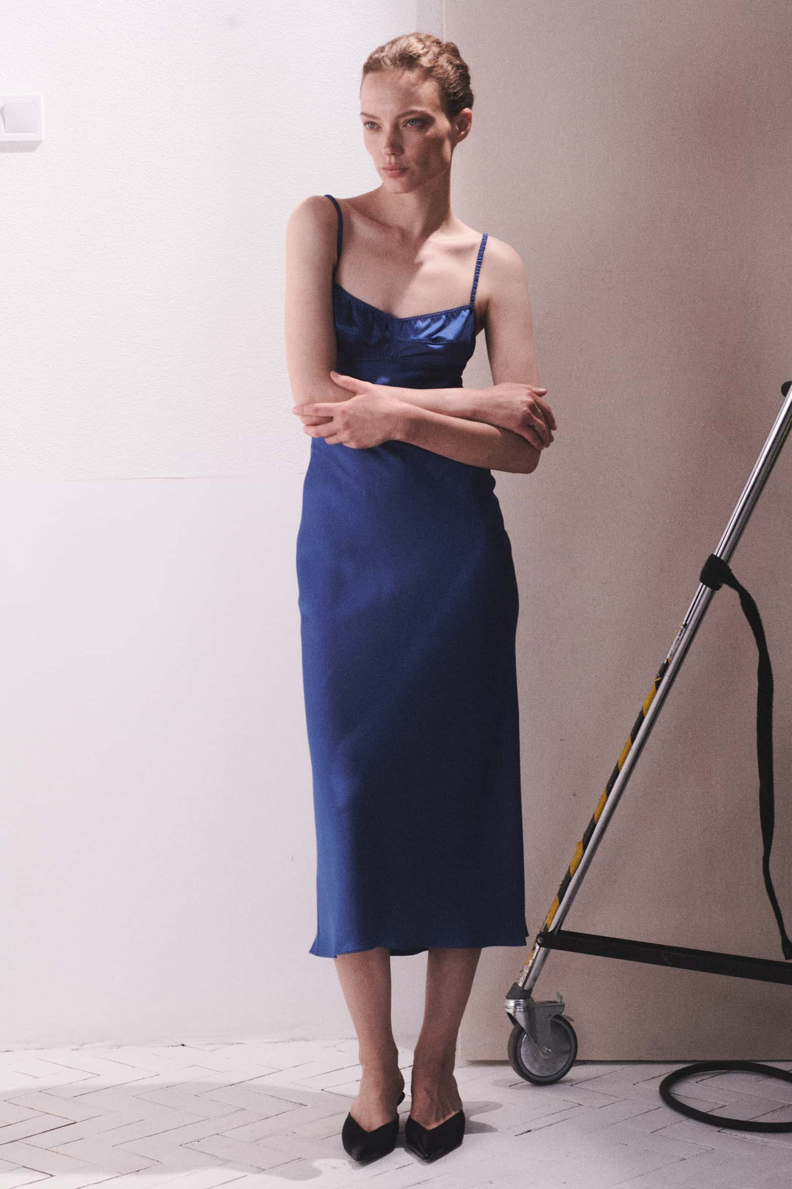 Model in blue Waterlily dress