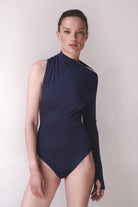 Model in Viola bodysuit