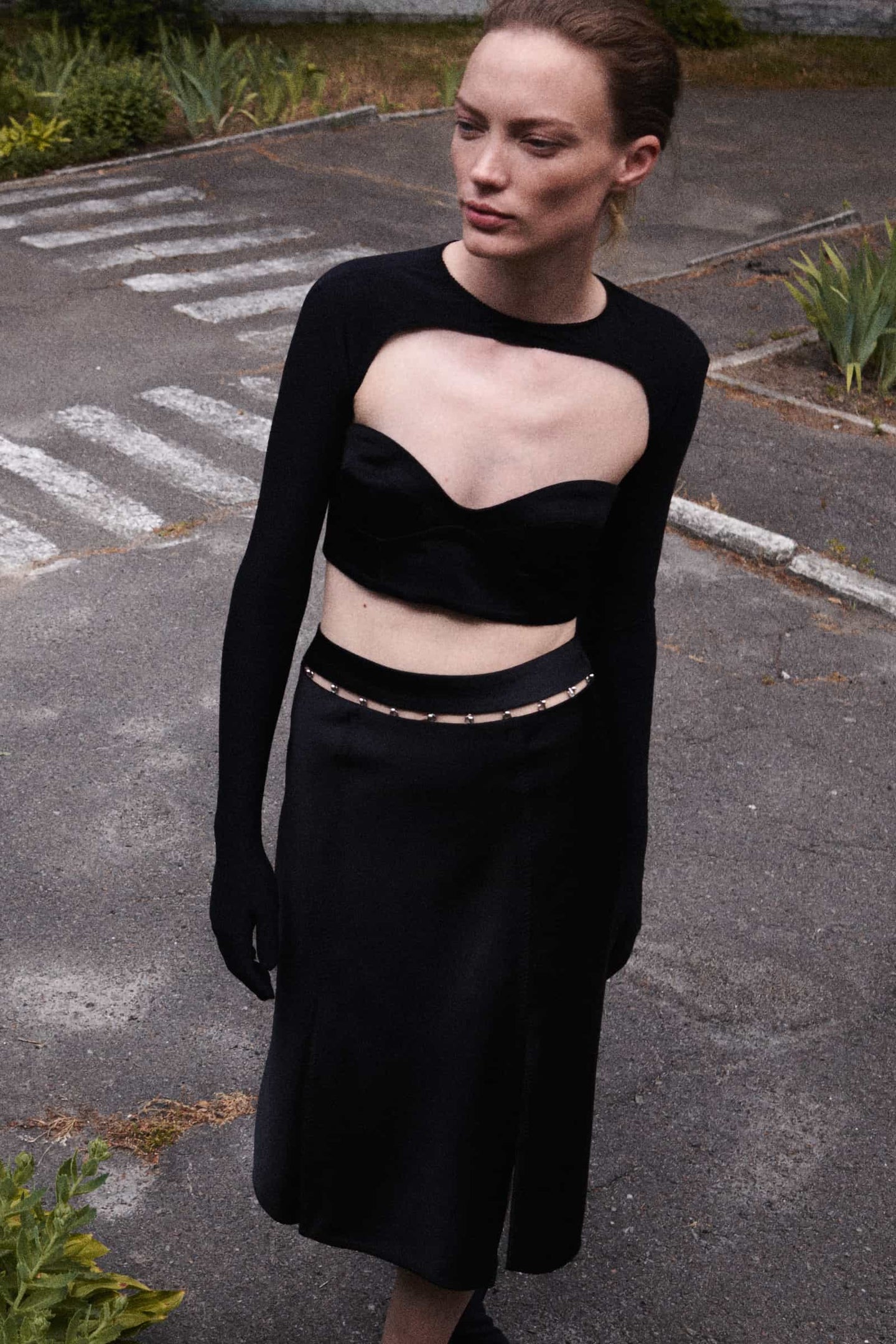 Model in black Yuna skirt