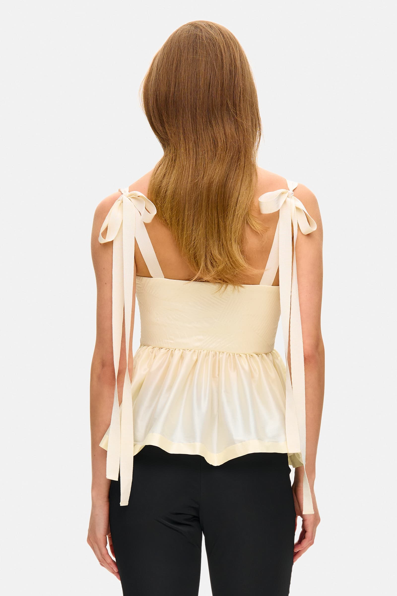 Model in Florine top with cups on straps back view